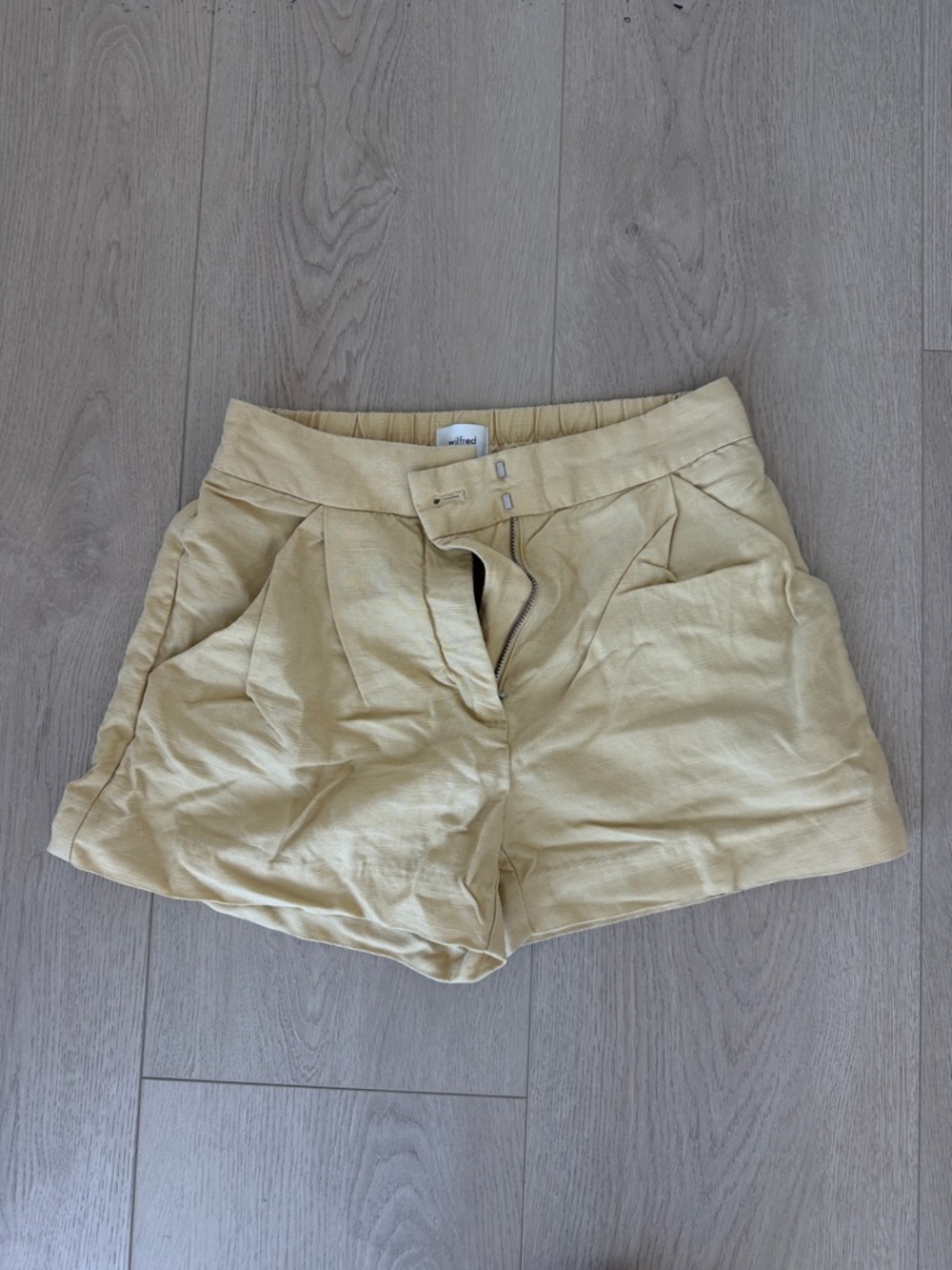 Wilfred Light Cream Pleated Bermuda Shorts